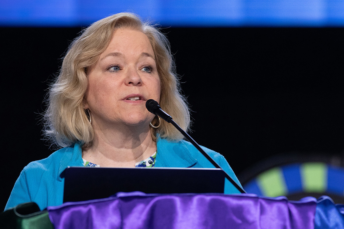 Diane Brown, a Michigan Conference delegate and chair of the credentials committee, gives a report on delegate numbers during the April 29 afternoon plenary of the United Methodist General Conference in Charlotte, N.C. Photo by Mike DuBose, UM News.