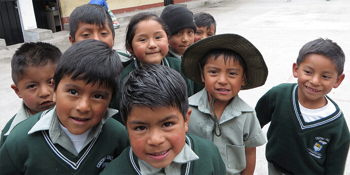 Students at El Sembrador school in Pastocalle, Ecuador, smile for a photo. Encounter with Christ in Latin America and the Caribbean, an endowed fund administered by the United Methodist Board of Global Ministries, has over the years distributed more than $1 million in small grants for Methodist mission work in Central and South America, Mexico and the Caribbean. Photo courtesy of Encounter With Christ.