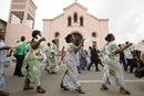 Church members walk in a parade to greet visitors at Temple Bethel United Methodist Church in the Abobo-Baoule neighborhood of Abidjan, Côte d'Ivoire, in 2015. The Côte d'Ivoire Conference voted May 28 to leave The United Methodist Church, but it has not left yet. File photo by Mike DuBose, UM News.