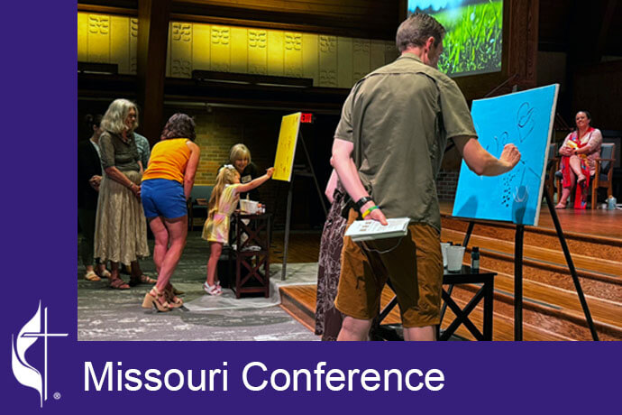 The worship team at Kirkwood United Methodist Church in St. Louis, Mo., invited people to be creative together and paint on canvases available at the front of the sanctuary during their summer worship series. Photo courtesy of the Missouri Conference.