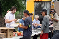Ice Angels volunteers from First United Methodist Church in Moore, Okla., serve lunch one Wednesday every month at a large lot near downtown Oklahoma City. Started by a United Methodist couple, Ice Angels has grown from handing out water to providing food and other services for unsheltered people. Serving (from left) are Monty Bower, Gabriel Krows, Linda Dowling, Linda Starling and Jo Bower. Photo by Boyce Bowdon, UM News.