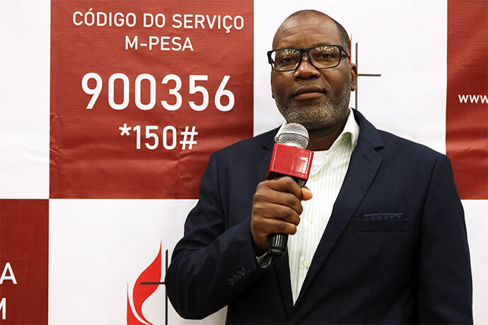 Armindo Venancio Mapoissa, chair of the Mozambique Episcopal Area’s online giving taskforce, speaks during the launch event for the Local Advance Project on July 31 at Malanga United Methodist Church in Maputo, Mozambique. The online platform allows church members to donate funds to support local initiatives. Photo by Roque Facela.