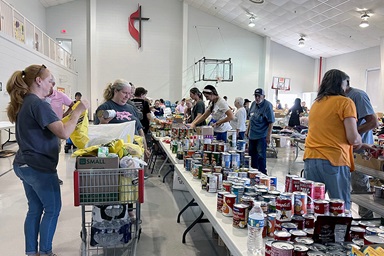 Members of Trinity United Methodist Church in Greeneville, Tenn., collect and distribute food, water and hygiene supplies to those affected by torrential rains in the aftermath of Hurricane Helene. Photo by Annette Spence, Holston Conference. Members of Trinity United Methodist Church in Greeneville, Tenn., collect and distribute food, water and hygiene supplies to those affected by torrential rains in the aftermath of Hurricane Helene. Photo by Annette Spence, Holston Conference.
