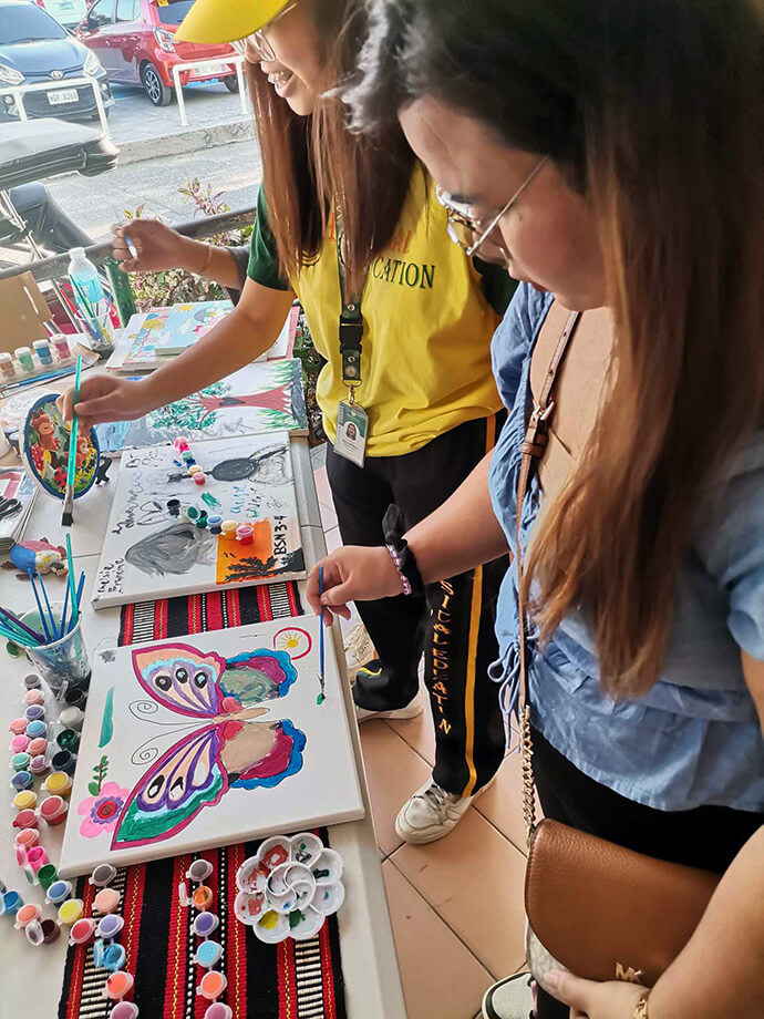Students from different colleges in Wesleyan University-Philippines participated in a Paint for A Cause fundraiser. The students gave their time, painting different things on canvas or 3D wax to donate for sale. The money collected was donated to the victims of the devastating landslides in Maco, Davao de Oro. Photo by Gladys P Mangiduyos, UM News.