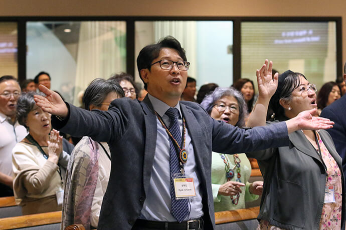 Participants sing during worship Oct. 9 at the 2024 Convocation of the Korean Association of The United Methodist Church at Los Angeles Korean United Methodist Church. During the gathering, Korean United Methodists reaffirmed their commitment to supporting global missionaries. Photo by the Rev. Thomas E Kim, UM News.