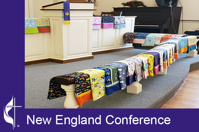 On a blessing Sunday, pillowcases are carefully draped over the alter rail creating a beautiful, bright, & colorful display. The New England Conference Pillowcase Project brings comfort to cancer patients. Photo courtesy of the New England Conference. On a blessing Sunday, pillowcases are carefully draped over the alter rail creating a beautiful, bright, & colorful display. The New England Conference Pillowcase Project brings comfort to cancer patients. Photo courtesy of the New England Conference.