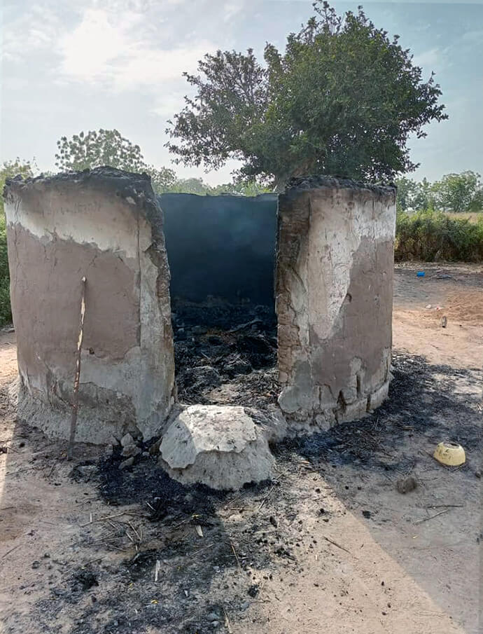 Two burned-out homes in Munga Dosso, Taraba State, are among the many that were damaged in clashes between members of the United Methodist and Global Methodist churches. Two children, ages 4 and 2, were killed in the December attacks on United Methodist homes. Photo courtesy of Bishop John Schol.
