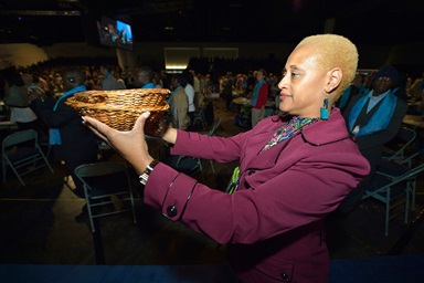 The Rev. Johnsie Whitfield Cogman helps collect the offering during opening worship service of the 2012 United Methodist General Conference in Tampa, Fla. Overall giving to denomination-wide ministries was down in 2024, compared to 2023. But the denomination’s financial leaders are hopeful that the significantly smaller budget approved at last year’s General Conference in Charlotte, N.C., will be much more in line with the denomination’s giving capacity. File photo by Paul Jeffrey, UM News. The Rev. Johnsie Whitfield Cogman helps collect the offering during opening worship service of the 2012 United Methodist General Conference in Tampa, Fla. Overall giving to denomination-wide ministries was down in 2024, compared to 2023. But the denomination’s financial leaders are hopeful that the significantly smaller budget approved at last year’s General Conference in Charlotte, N.C., will be much more in line with the denomination’s giving capacity. File photo by Paul Jeffrey, UM News.