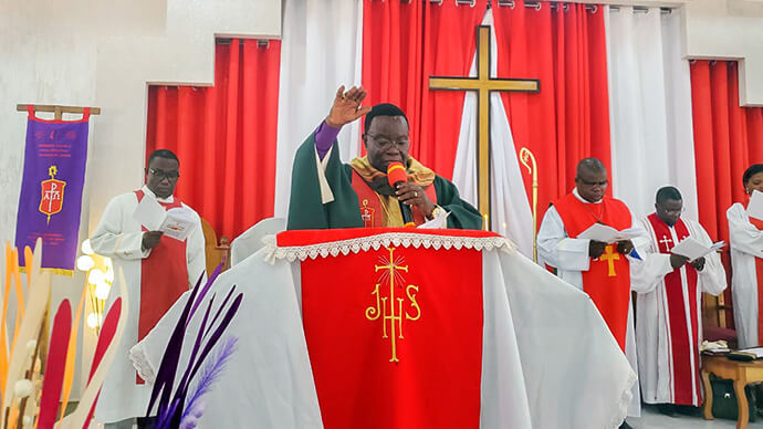Bishop Owan Tshibang Kasap, who leads the South Congo Episcopal Area, delivers the sermon during the inaugural service at the newly built Mont Morija United Methodist Church in Golf Plateau III in Lubumbashi, Congo. Photo courtesy of the Jerusalem District.