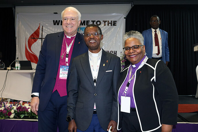 The Rev. Emmanuel Sinzohagera of Burundi (center) poses for a photo with Bishops Thomas Bickerton and LaTrelle Easterling after being elected a bishop on March 15 at the Africa Central Conference in Johannesburg. Bickerton and Easterling are representing the Council of Bishops at the central conference. Photo by Eveline Chikwanah, UM News.