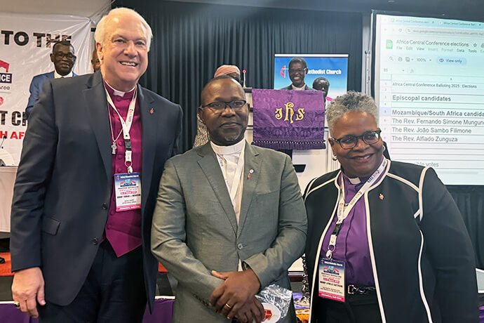 The Rev. João Filimone Sambo (center) poses for a photo with Bishops Thomas Bickerton and LaTrelle Easterling after being elected a bishop at the Africa Central Conference in Johannesburg. Bickerton and Easterling are representing the Council of Bishops at the central conference. Photo by Priscilla Muzerengwa, United Methodist Communications.