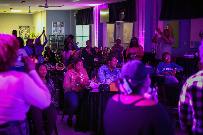 People enjoy gospel karaoke at Tindley Tea Cafe at Tindley Temple United Methodist Church in Philadelphia in October 2024. Photo courtesy of Tindley Temple United Methodist Church.