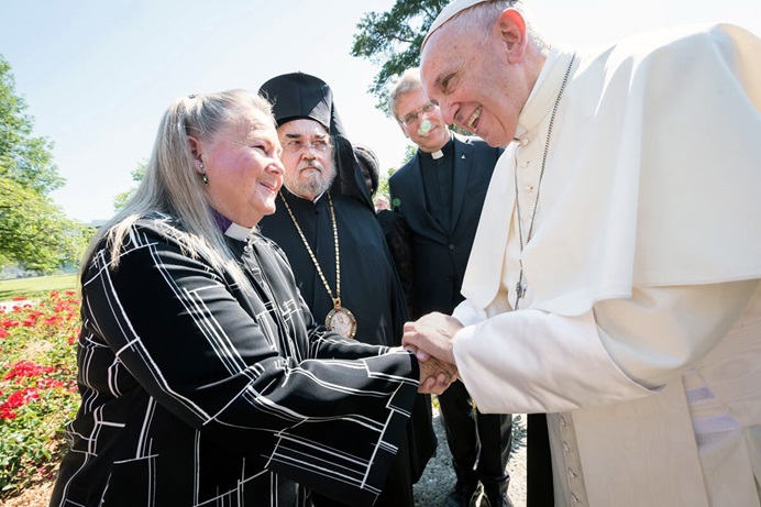 United Methodist Bishop Mary Ann Swenson greets Pope Francis in Geneva, Switzerland, in 2018, during the commemoration of the World Council of Churches’ 70th anniversary. The leader of the Catholic Church spoke about the significance of Catholic involvement in ecumenical work and pledged his commitment to the cause of Christian unity. United Methodists around the world are mourning Pope Francis, who died April 21 at age 88. File photo by Albin Hillert, World Council of Churches. United Methodist Bishop Mary Ann Swenson greets Pope Francis in Geneva, Switzerland, in 2018, during the commemoration of the World Council of Churches’ 70th anniversary. The leader of the Catholic Church spoke about the significance of Catholic involvement in ecumenical work and pledged his commitment to the cause of Christian unity. United Methodists around the world are mourning Pope Francis, who died April 21 at age 88. File photo by Albin Hillert, World Council of Churches.