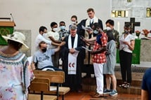 The Rev. Alexander von Wascinski receives a blessing from his congregation at Peace Church United Methodist in Munich, Germany. Photo courtesy of Peace Church United Methodist, via Facebook. Facebook. The Rev. Alexander von Wascinski receives a blessing from his congregation at Peace Church United Methodist in Munich, Germany. Photo courtesy of Peace Church United Methodist, via Facebook. Facebook.