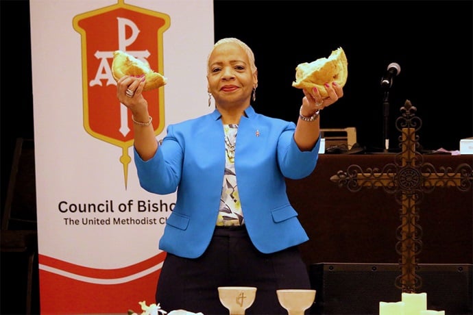 Council of Bishops President Tracy S. Malone, who also leads the Indiana Conference, officiates at Holy Communion at closing worship for the Council of Bishops meeting, April 27-May 2 in Chicago. During the meeting, the bishops unveiled a new vision statement that they plan to help the denomination live out. Photo by Rick Wolcott, Council of Bishops. Council of Bishops President Tracy S. Malone, who also leads the Indiana Conference, officiates at Holy Communion at closing worship for the Council of Bishops meeting, April 27-May 2 in Chicago. During the meeting, the bishops unveiled a new vision statement that they plan to help the denomination live out. Photo by Rick Wolcott, Council of Bishops.