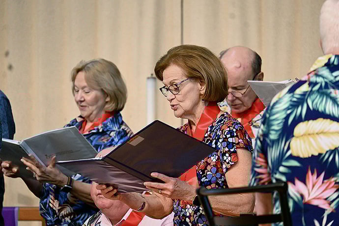 Jan West (center) performs April 10 at Epworth United Methodist Church in Rehoboth Beach, Del., with the other singers in the Parkinson’s Education and Support Group of Sussex County Choir. Photo by Jim Patterson, UM News.