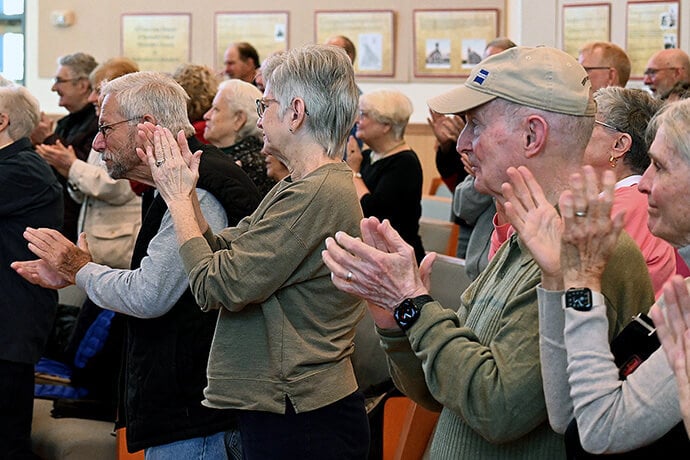 Family and friends of members of the Parkinson’s Education and Support Group of Sussex County Choir applaud after a number performed April 10 at Epworth United Methodist Church in Rehoboth Beach, Del. Photo by Jim Patterson, UM News.
