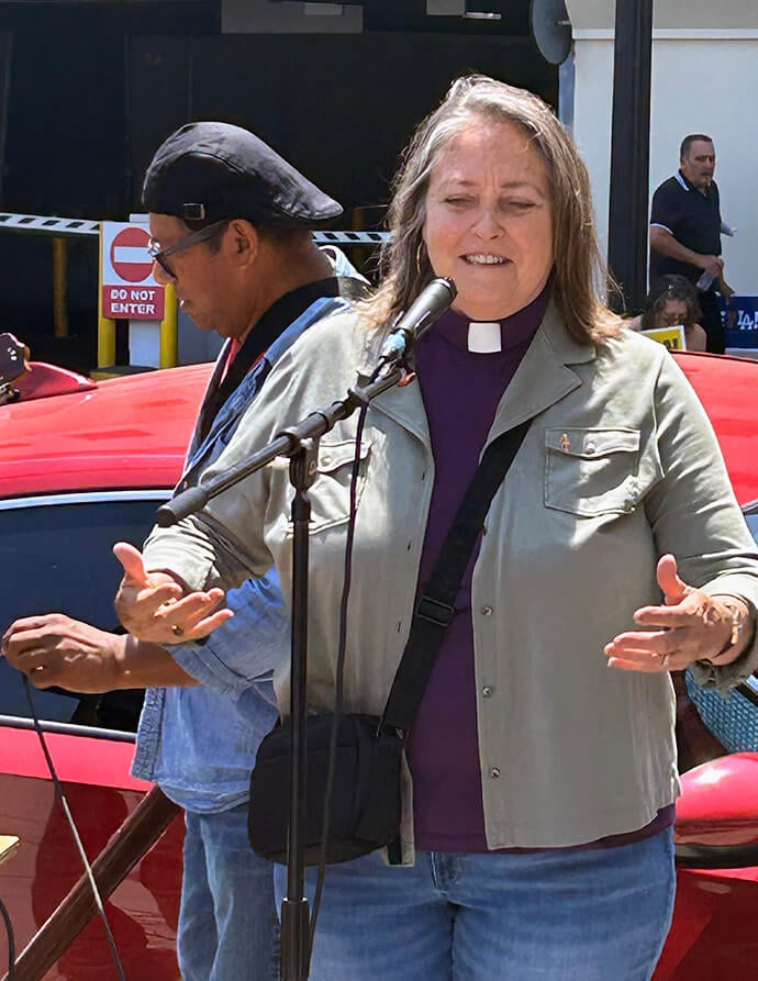 Bishop Dottie Escobedo-Frank of the California-Pacific Conference speaks during a June 9 protest against ICE in Pasadena, Calif. She had spent the morning with the congregation of Community United Methodist Church, which is rebuilding after January’s wildfires. Photo by the Rev. Amy Aitken, First United Methodist Church, Pasadena.