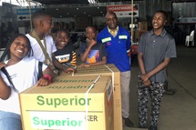 Members of the Harare (Zimbabwe) Inner-City United Methodist Church’s junior Sunday school class pose with some of their gifts for the local hospital’s pediatric unit. The children and teachers donated medical supplies, stoves and gifts for children. Appliance salesperson Roper Chakava stands second from right. Photo by Chenayi Kumuterera, UM News. Members of the Harare (Zimbabwe) Inner-City United Methodist Church’s junior Sunday school class pose with some of their gifts for the local hospital’s pediatric unit. The children and teachers donated medical supplies, stoves and gifts for children. Appliance salesperson Roper Chakava stands second from right. Photo by Chenayi Kumuterera, UM News.