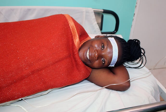 Caroline Checha, 26, from Zengeni Village Penhalonga, visits the Old Mutare Mission Hospital for a surgical procedure. Checha first came to the hospital in 2017 when she gave birth to twins. She was surprised and pleased with the upgrades. “The renovated theater is beautiful and modern.” Photo by Kudzai Chingwe, UM News.