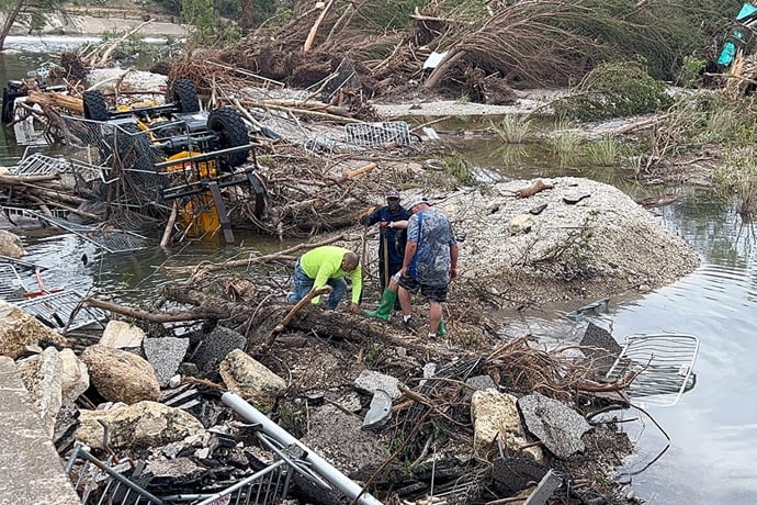 Workers search through debris at Louise Hays Park in Kerrville, Texas, on July 6 after catastrophic floods over the Fourth of July weekend killed at least 95 people, including 27 campers and counselors at nearby Camp Mystic. Photo by the Rev. Amanda Banda, Rio Texas Conference. Workers search through debris at Louise Hays Park in Kerrville, Texas, on July 6 after catastrophic floods over the Fourth of July weekend killed at least 95 people, including 27 campers and counselors at nearby Camp Mystic. Photo by the Rev. Amanda Banda, Rio Texas Conference.