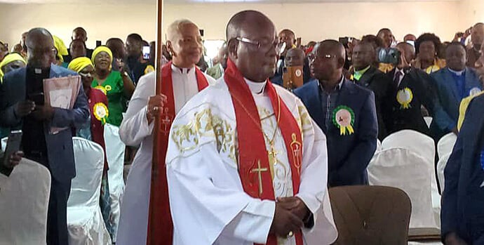East Congo Area Bishop Gabriel Yemba Unda, president of the Mid Africa College of Bishops, and Indiana Conference Bishop Tracy S. Malone, president of the United Methodist Council of Bishops, lead a procession of bishops as the Mid Africa Central Conference opens July 10 in Kitwe, Zambia. Photo by Judith Osongo, East Congo Episcopal Area.