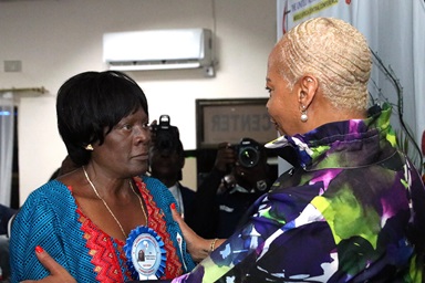 Council of Bishops President Tracy S. Malone (right) congratulates the Rev. Mujinga Kashala after her election as a United Methodist bishop on July 12 during the Mid Africa Central Conference in Kitwe, Zambia. Kashala is the second woman elected a United Methodist bishop on the African continent and the first in Mid Africa. Photo by Chadrack Tambwe Londe, UM News.  Council of Bishops President Tracy S. Malone (right) congratulates the Rev. Mujinga Kashala after her election as a United Methodist bishop on July 12 during the Mid Africa Central Conference in Kitwe, Zambia. Kashala is the second woman elected a United Methodist bishop on the African continent and the first in Mid Africa. Photo by Chadrack Tambwe Londe, UM News.