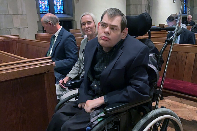 Powell Richardson and his family sit in a special row in the sanctuary of Church Street United Methodist in Knoxville, Tenn. Church Street recently added designated spaces to better accommodate persons in wheelchairs. Photo from video by Lilla Marigza, UM News. Powell Richardson and his family sit in a special row in the sanctuary of Church Street United Methodist in Knoxville, Tenn. Church Street recently added designated spaces to better accommodate persons in wheelchairs. Photo from video by Lilla Marigza, UM News.
