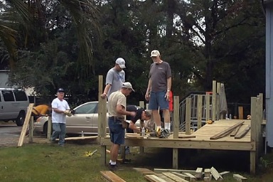 A crew from Ginghamsburg United Methodist Church in Tipp City, Ohio, builds a wheelchair ramp for a homeowner in Slidell, Louisiana, following Hurricane Katrina. Video image courtesy of Ginghamsburg United Methodist Church by UM News. A crew from Ginghamsburg United Methodist Church in Tipp City, Ohio, builds a wheelchair ramp for a homeowner in Slidell, Louisiana, following Hurricane Katrina. Video image courtesy of Ginghamsburg United Methodist Church by UM News.