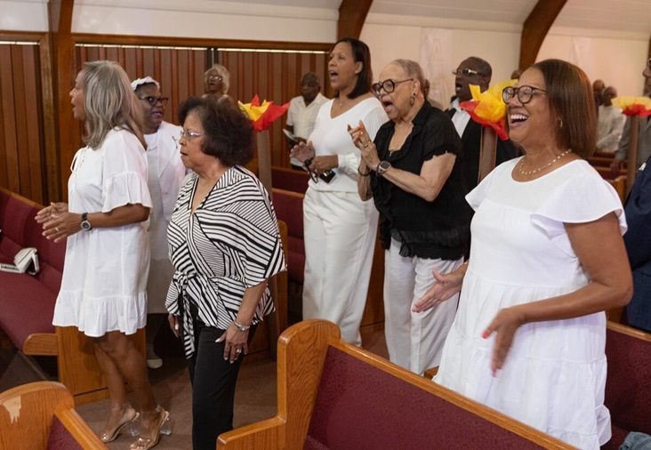Members of the choir process into the sanctuary during worship at Hartzell Mt. Zion United Methodist Church in Slidell, La. Photo by Mike DuBose, UM News.