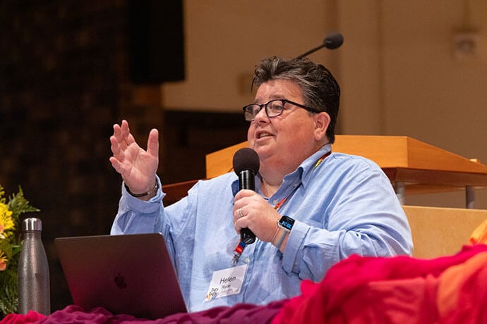 Helen Ryde, Reconciling Ministries Network’s director of mission impact, compares the fall of church barriers to the walls of Jericho tumbling down in the Book of Joshua. Ryde is also a United Methodist home missioner, which is a lay ministry role. Photo by Joscie Cutchens, UM News.