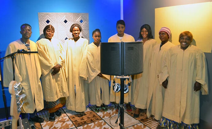 The soprano section of the New Covenant United Methodist Choir poses for a photo after recording a song in the church’s new South Congo studio. The studio is seen as a tool for spiritual outreach and self-sustainability. Photo by Jenovic Mandandj, UM News.