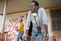 E. Dwight Franklin helps with the gutting of his parents’ home in New Orleans six months after Hurricane Katrina. Virginia Tech student Ivy Gorman (background) was part of a team from her school working through the Louisiana United Methodist Storm Recovery Center during their spring vacation. A UMNS photo by Mike DuBose. E. Dwight Franklin helps with the gutting of his parents’ home in New Orleans six months after Hurricane Katrina. Virginia Tech student Ivy Gorman (background) was part of a team from her school working through the Louisiana United Methodist Storm Recovery Center during their spring vacation. A UMNS photo by Mike DuBose.