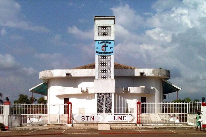 Stephen Trowen (S.T.) Nagbe United Methodist Church in Monrovia, Liberia, recently reopened after being closed due to disruptions between current and former church members. The reopening came in the wake of a civil court ruling that affirmed the Liberia Conference as the owner of all properties registered in its name that are under dispute, including churches, schools, health facilities and universities. Photo by E Julu Swen, UM News. Stephen Trowen (S.T.) Nagbe United Methodist Church in Monrovia, Liberia, recently reopened after being closed due to disruptions between current and former church members. The reopening came in the wake of a civil court ruling that affirmed the Liberia Conference as the owner of all properties registered in its name that are under dispute, including churches, schools, health facilities and universities. Photo by E Julu Swen, UM News.