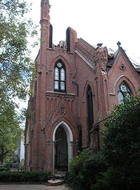 Rayne United Methodist Church is left without its steeple and much of the bell tower after Hurricane Katrina. Photo courtesy of the Rev. Callie Winn Crawford.
