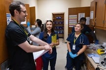 Medical students work in the lab at Luke’s House, a free health clinic in New Orleans. From left, with faces visible, are Ryan Barry, Zahra Naeini, Karla Gallegos Díaz and Amelie Jacobs. A United Methodist pastor helped start the clinic in 2006 in response to the health care gap left by Hurricane Katrina. Photo by Mike DuBose, UM News. Medical students work in the lab at Luke’s House, a free health clinic in New Orleans. From left, with faces visible, are Ryan Barry, Zahra Naeini, Karla Gallegos Díaz and Amelie Jacobs. A United Methodist pastor helped start the clinic in 2006 in response to the health care gap left by Hurricane Katrina. Photo by Mike DuBose, UM News.