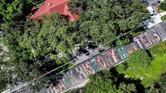 Vista aérea feita por um drone do mural "Black History Matters" em frente ao Museu Afro-Americano Woodson da Flórida, na 9ª Avenida S, 2240, na quinta-feira, 31 de julho de 2025, em São Petersburgo. Autoridades estaduais e federais de transporte estão ordenando que as cidades removam os murais de faixas de pedestres, alegando problemas de segurança. ©Dirk Shadd© Tampa Bay Times Vista aérea feita por um drone do mural "Black History Matters" em frente ao Museu Afro-Americano Woodson da Flórida, na 9ª Avenida S, 2240, na quinta-feira, 31 de julho de 2025, em São Petersburgo. Autoridades estaduais e federais de transporte estão ordenando que as cidades removam os murais de faixas de pedestres, alegando problemas de segurança. ©Dirk Shadd© Tampa Bay Times