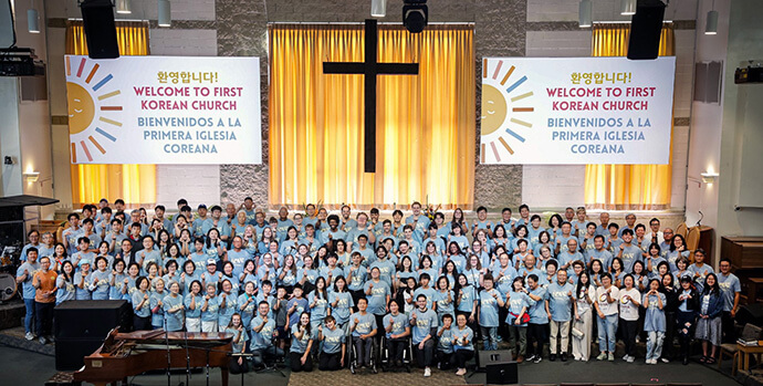 Volunteers gather for a photo and orientation before Chicago First Korean United Methodist Church in Wheeling, Ill., celebrates its 102nd anniversary on Sept. 13 with a special event for refugees and neighbors. The event had more than 170 volunteers and support from community organizations. Photo courtesy of Chicago First Korean United Methodist Church.