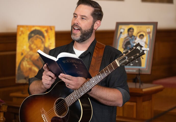 The Rev. Ryan Hebel helps lead opening worship for the 2025 United Methodist Church Deacons Gathering at the Upper Room Chapel in Nashville, Tenn. Hegel is a deacon who is now working with The Gathering, a United Methodist congregation in St. Louis, to plant a new church. Photo by Mike DuBose, UM News.
