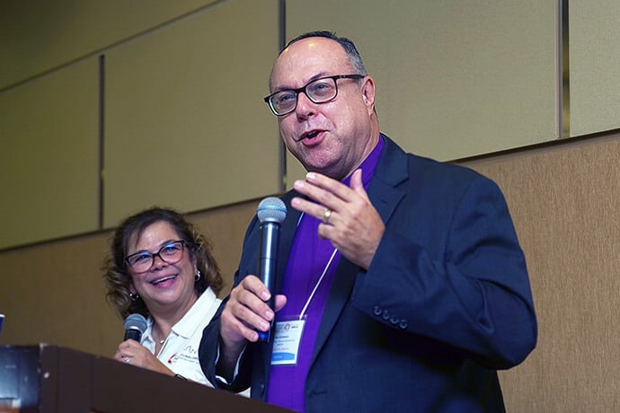 Bishop Dan Schwerin, episcopal leader of the Northern Illinois Conference, delivers the opening sermon at MARCHA’s 53rd annual gathering in Chicago. Photo by the Rev. Gustavo Vasquez, UM News.