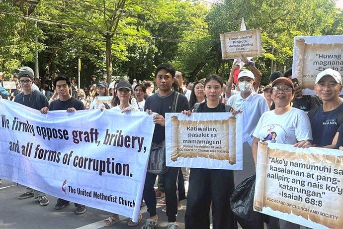 Filipino United Methodists join thousands of protesters in the Trillion Peso March Sept. 21 as they walk to Rizal Park in Manila, Philippines. The demonstrators called for accountability and transparency by government officials amid allegations of large-scale corruption. Photo courtesy of Blessy Grace De Leon. Filipino United Methodists join thousands of protesters in the Trillion Peso March Sept. 21 as they walk to Rizal Park in Manila, Philippines. The demonstrators called for accountability and transparency by government officials amid allegations of large-scale corruption. Photo courtesy of Blessy Grace De Leon.