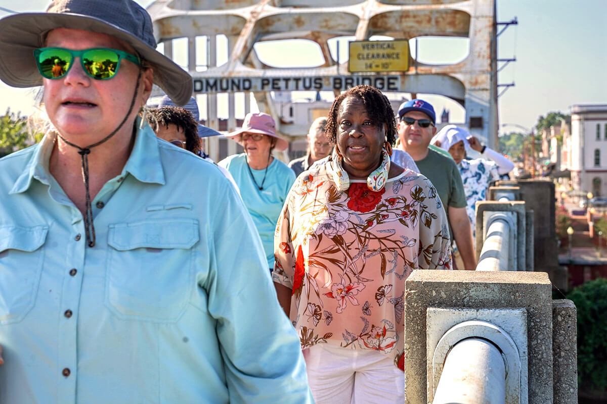 Members of four annual conferences in the U.S. Northeast cross the Edmund Pettus Bridge in Selma, Ala., where police attacked peaceful marchers on March 7, 1965, on what is known as Bloody Sunday. The visit was part of the group’s July 12-19 Civil Rights Journey, a tour of sacred sites of the Civil Rights Movement. Photo by Jeannie Schott, Western Pennsylvania Conference.