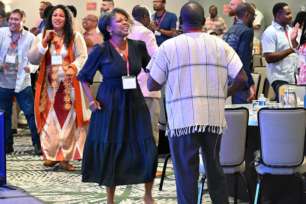 Participants at the Facing the Future 2025 conference take a dance break Oct. 7 at Sonesta Los Angeles Airport hotel in Los Angeles. The national conference examined the challenges of cross-cultural and cross-racial clergy. Photo by Jim Patterson, UM News.