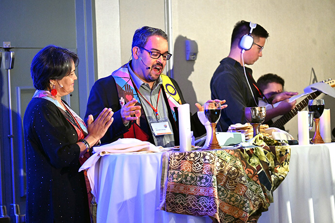 The Rev. Giovanni Arroyo presides over Holy Communion Oct. 7 at the Facing the Future 2025 conference in Los Angeles, where cross-cultural and cross-racial clergy gathered to compare notes and seek new inspiration. Arroyo is the top executive of the United Methodist Commission on Religion and Race, which organized the event. Photo by Jim Patterson, UM News.