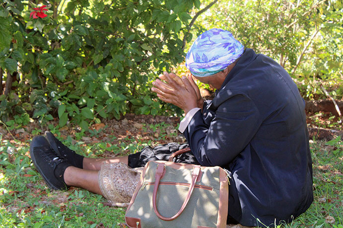 Beauty Baruwa sits with God in prayer during a Mountain Prayer Program at Ewanrigg Botanical Gardens in Harare, Zimbabwe. The retreat was an activity planned by the Harare East District’s Women of Substance. Photo by Kudzai Chingwe, UM News.