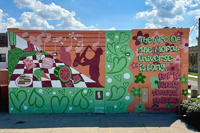 A mural outside the Marketplace for All People, a United Methodist ministry in Toledo, Ohio, comforts patrons with a famous quote by the Rev. Martin Luther King Jr. Photo courtesy of the Rev. Leo Cunningham.