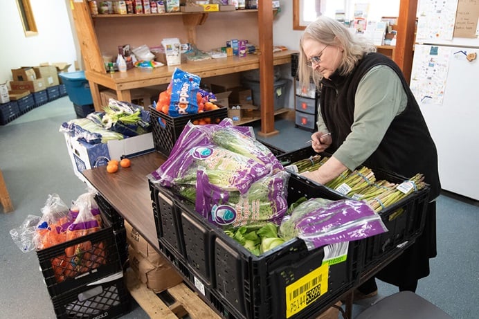 Ola Williams sorts through donated produce at the Willow Community Food Pantry in Willow, Alaska. Williams serves as director of the pantry, a ministry of Willow United Methodist Church. 2023 file photo by Mike DuBose, UM News. Ola Williams sorts through donated produce at the Willow Community Food Pantry in Willow, Alaska. Williams serves as director of the pantry, a ministry of Willow United Methodist Church. 2023 file photo by Mike DuBose, UM News.