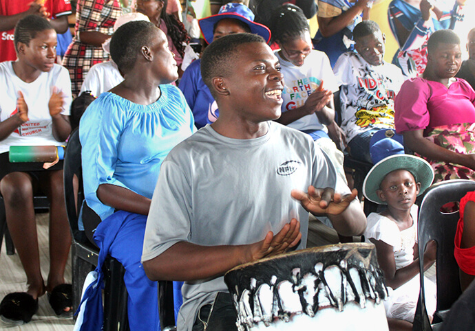 Steven Chifamba, the eldest son of Pastor Zondai and Edith Chifamba, beats the drums during worship at United Methodist Birchenough Local Church in Zimbabwe. Steven helped his father lay bricks for the new sanctuary. Photo by Kudzai Chingwe, UM News. 