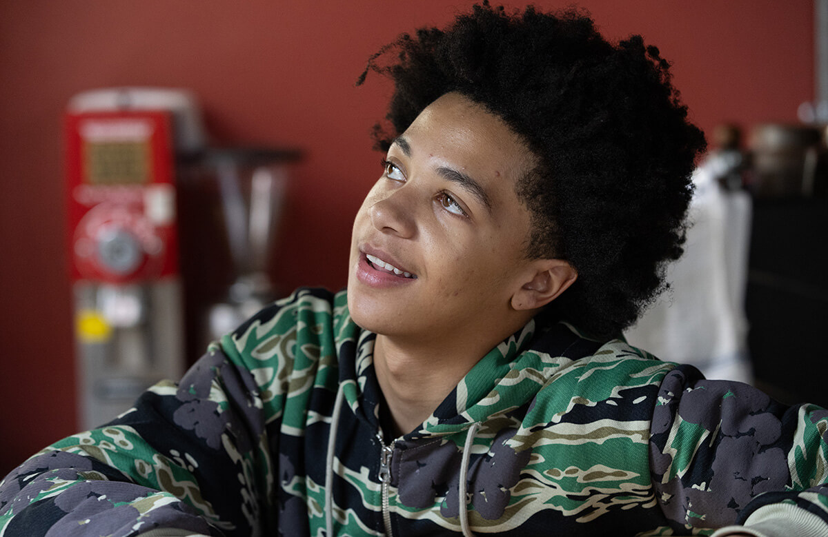 Shilone Knight, 17, describes his dreams for the future while working as a barista at the Deep Time ministry. Knight says he wants to become a computer engineer. Photo by Mike DuBose, UM News.