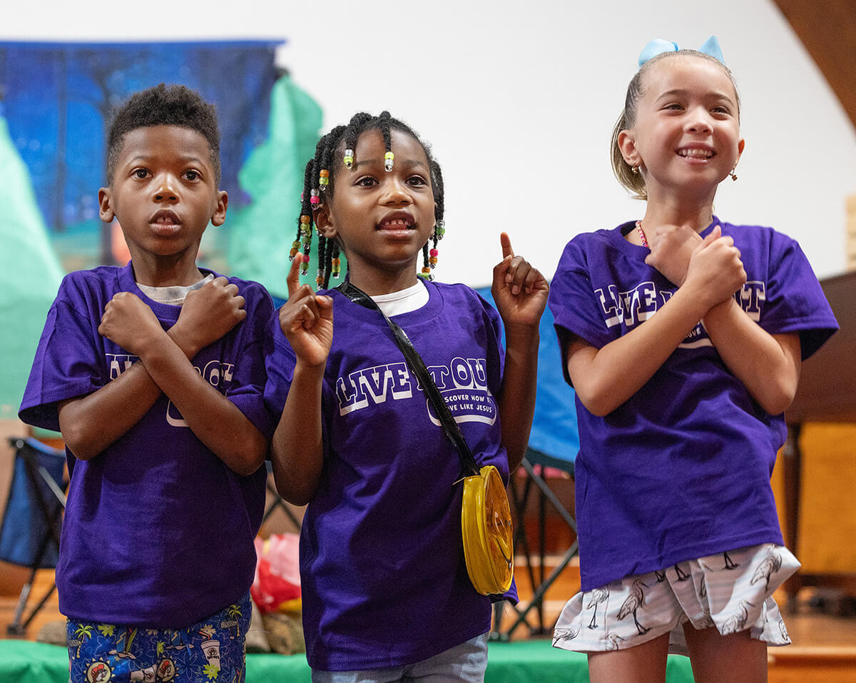 Children perform a skit during vacation Bible school at Hartzell Mt. Zion United Methodist Church. From left are Kobe Nichols, Landry O’neal and Aspen Newberry. Photo by Mike DuBose, UM News.